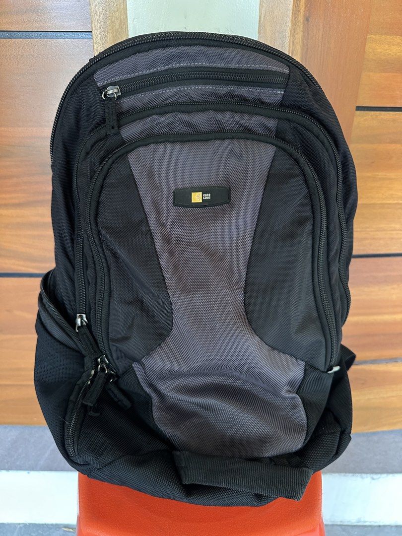 Case Logic Black Backpack with padded sleeve for laptop (Category: Backpacks) located in Caloocan City. Submitted by kween.of.decluttering (Listing ID 1435013210, Image 1). Description: - Durable Case Logic backpack - Color: Black and gray - Multiple zippered compartments - Front pocket for easy access - Main compartment for storage - Padded straps for comfort - Mesh back panel for breathability - Top handle for carrying - Ideal for everyday use 