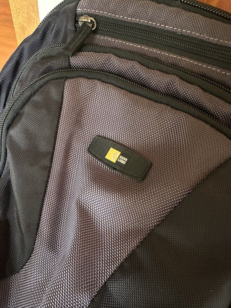 Case Logic Black Backpack with padded sleeve for laptop (Category: Backpacks) located in Caloocan City. Submitted by kween.of.decluttering (Listing ID 1435013210, Image 3). Description: - Durable Case Logic backpack - Color: Black and gray - Multiple zippered compartments - Front pocket for easy access - Main compartment for storage - Padded straps for comfort - Mesh back panel for breathability - Top handle for carrying - Ideal for everyday use 