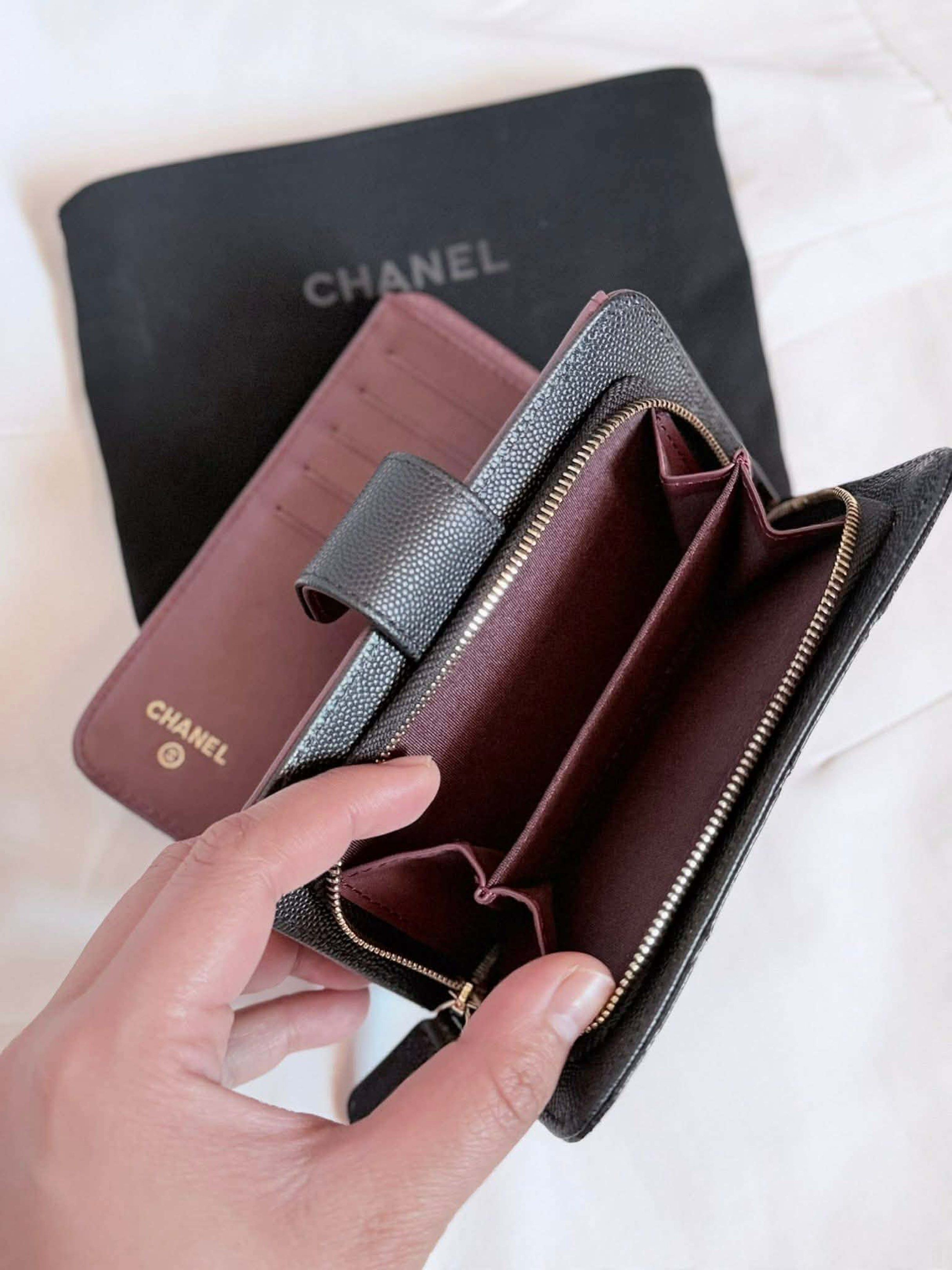 Chanel Quilted Caviar Leather Wallet (NGA) (Category: Luxury Bags & Wallets) located in Manila. Submitted by avellene (Listing ID 1435167622, Image 2). Description: - Black quilted caviar leather - Snap closure - Burgundy leather lining - Multiple card slots - Zippered coin compartment - Includes Chanel dust bag NGA.