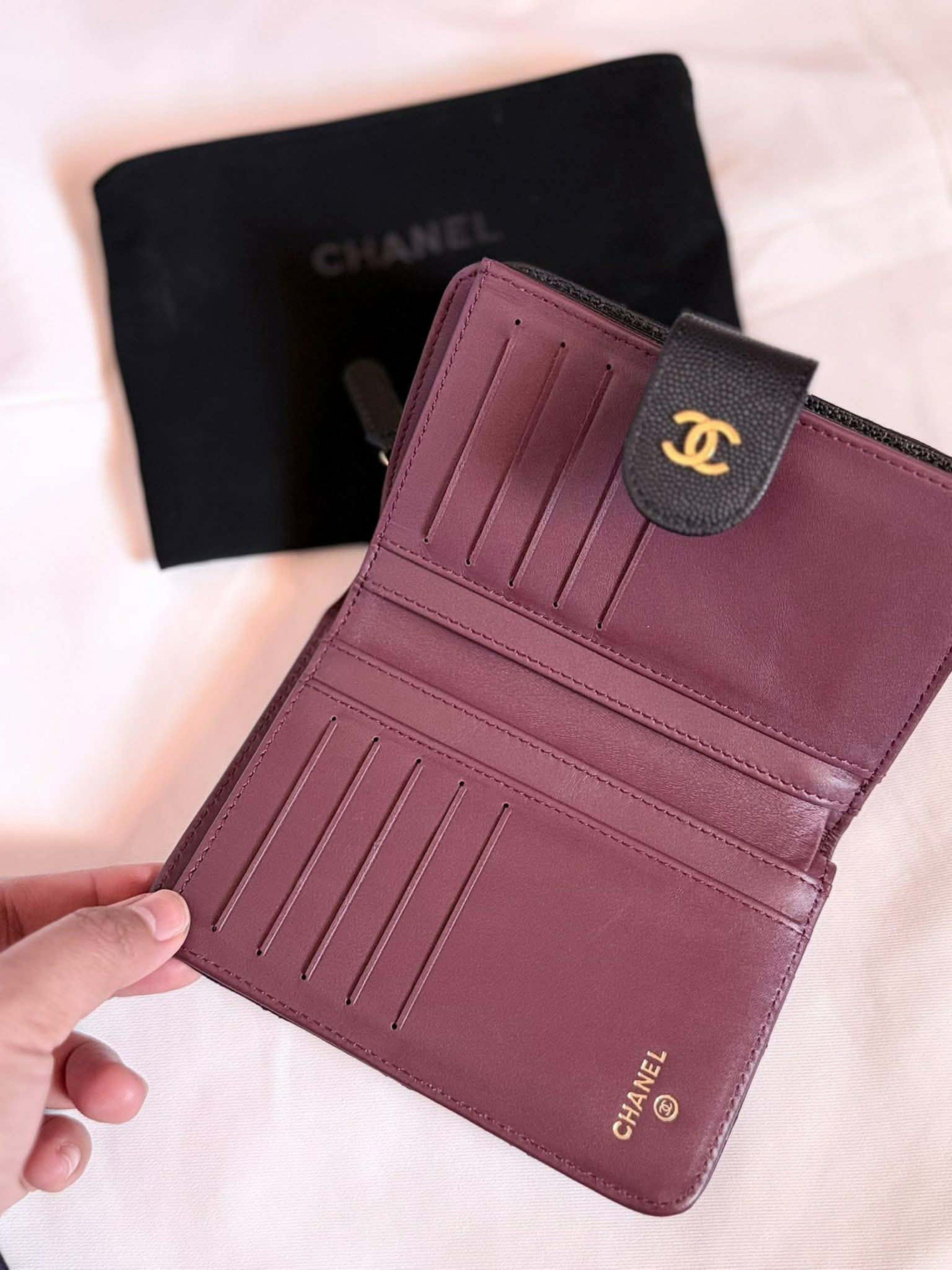 Chanel Quilted Caviar Leather Wallet (NGA) (Category: Luxury Bags & Wallets) located in Manila. Submitted by avellene (Listing ID 1435167622, Image 3). Description: - Black quilted caviar leather - Snap closure - Burgundy leather lining - Multiple card slots - Zippered coin compartment - Includes Chanel dust bag NGA.