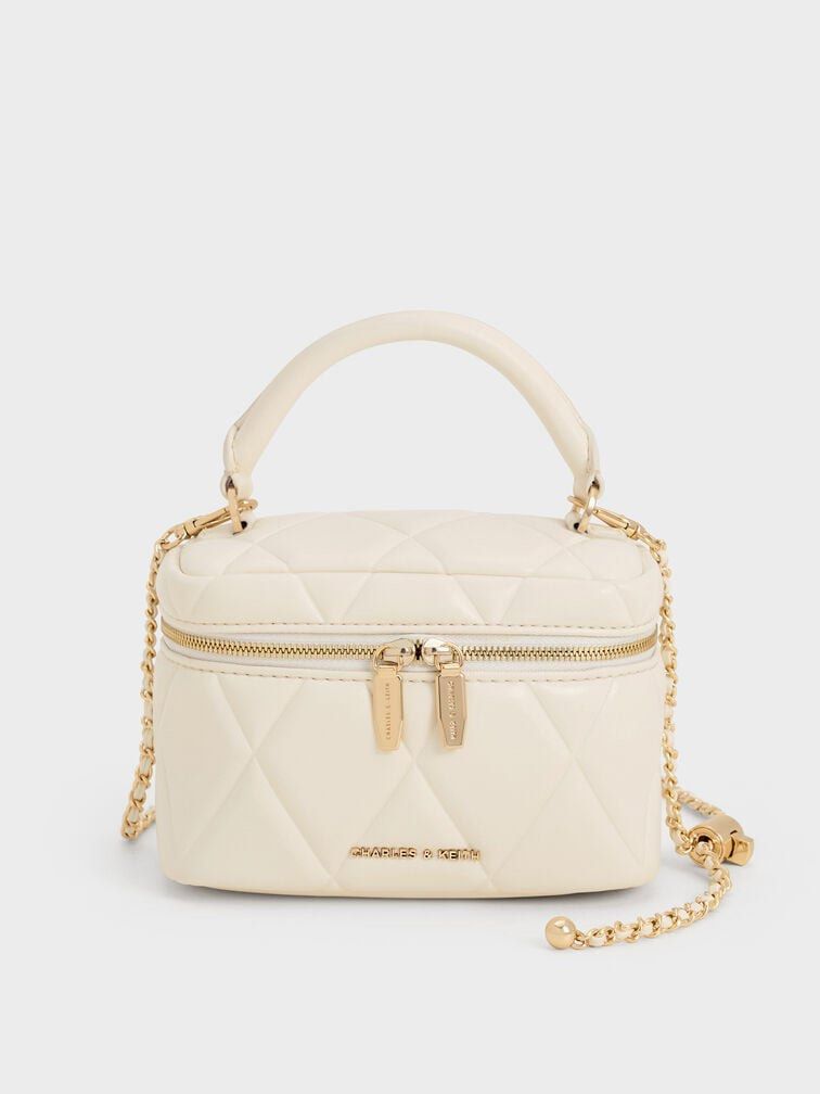 Charles & Keith Arwen Vanity Bag - Cream (Category: Cross-body Bags) located in Pasig City. Submitted by ff.ph (Listing ID 1435029680, Image 1). Description: Color Cream Fixed price With Box With detachable sling Size 7 inches Add paperbag plus 80 .