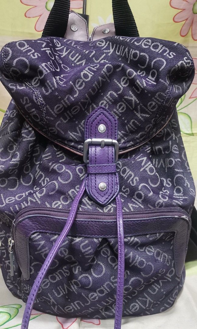 158 CK CALVIN KLEIN purple monogram backpack bag (Category: Backpacks) located in Baguio. Submitted by princessjhade (Listing ID 1435075119, Image 2). Description: Very good condition Plus shipping Medium.
