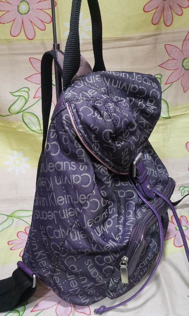 158 CK CALVIN KLEIN purple monogram backpack bag (Category: Backpacks) located in Baguio. Submitted by princessjhade (Listing ID 1435075119, Image 3). Description: Very good condition Plus shipping Medium.