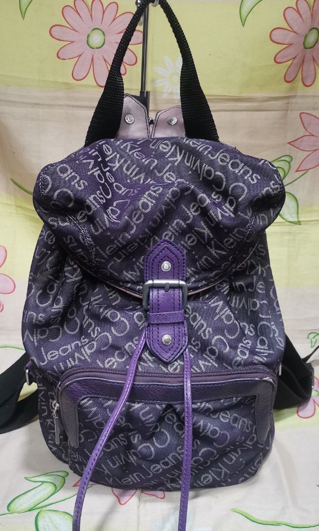 158 CK CALVIN KLEIN purple monogram backpack bag (Category: Backpacks) located in Baguio. Submitted by princessjhade (Listing ID 1435075119, Image 1). Description: Very good condition Plus shipping Medium.