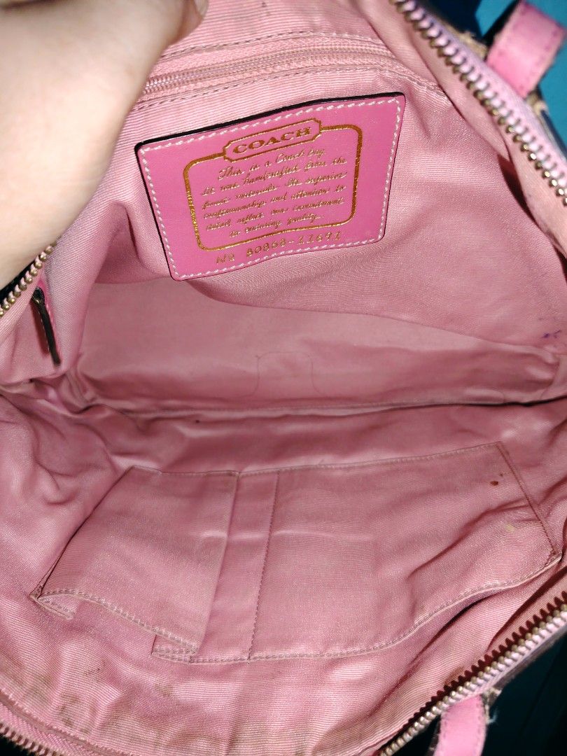 Coach Pink and Brown Tote Bag (Category: Luxury Bags & Wallets) located in Manila. Submitted by freestone-5d55 (Listing ID 1435107885, Image 3). Description: - Coach tote bag - Pink and brown color - Signature Coach pattern - Front pocket with button closure - Top zip closure - Pink interior - Multiple pockets - Coach label.