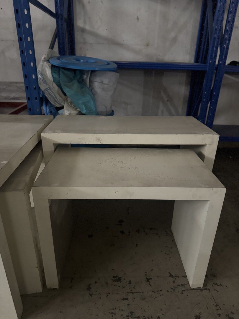 Nesting Side Tables (Category: Tables & Sets) located in Las Pinas. Submitted by kookai14 (Listing ID 1435108643, Image 1). Description: - Set of two nesting tables - Rectangular shape - Modern design - Light color - Ideal for living rooms and bedrooms - Stylish and functional.