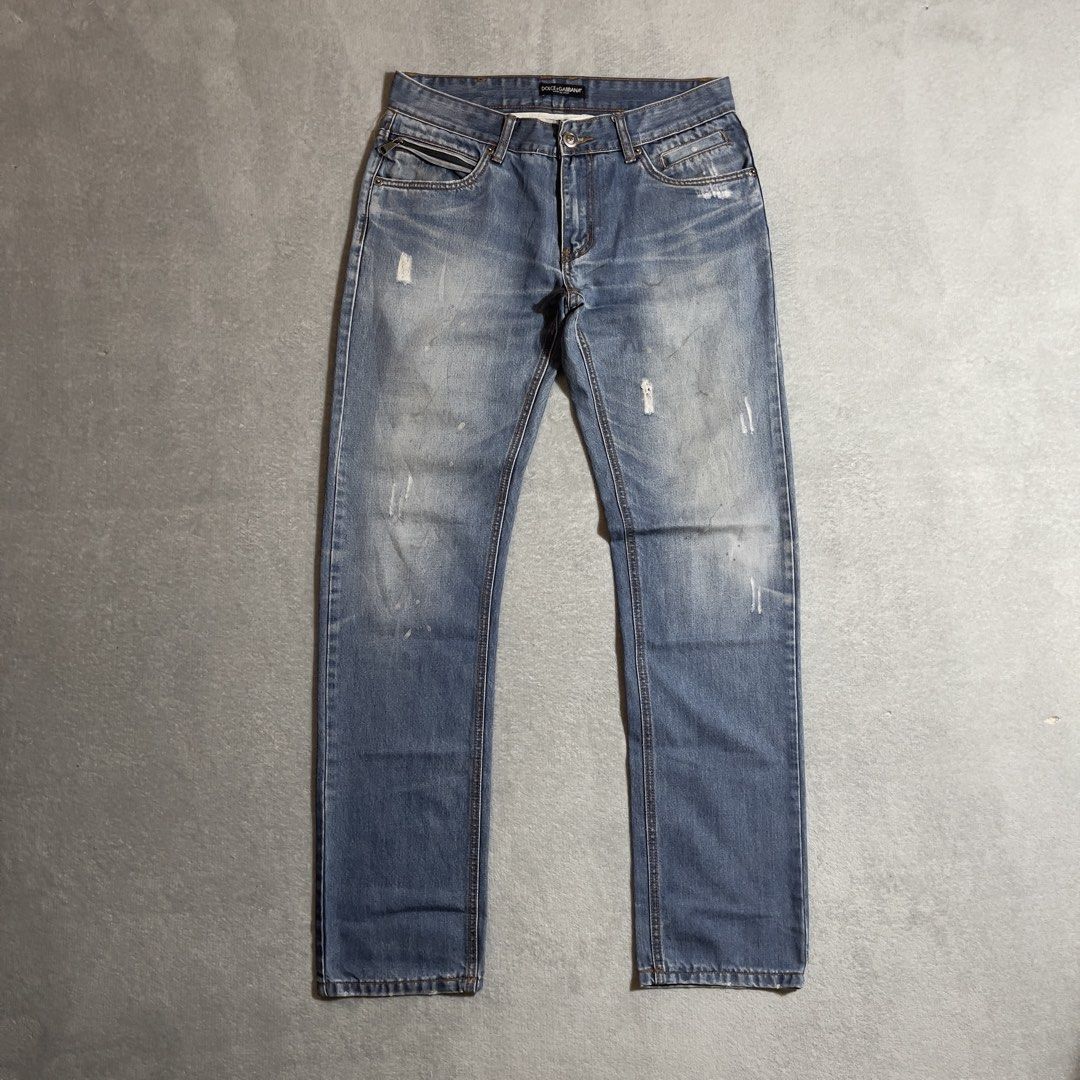 Dolce & Gabbana Distressed Jeans (Category: Jeans) located in Bayombong. Submitted by rochelle_archive_garments (Listing ID 1435159903, Image 1). Description: - Authentic Dolce & Gabbana jeans - Light blue wash - Zip pocket detail - Distressed accents - Classic five-pocket design - Button and zip fly closure - Brand name visible on waistband - Stylish and versatile.