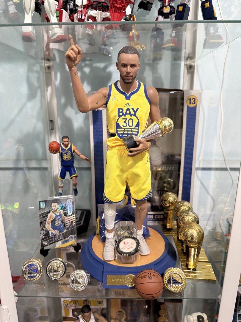 Enterbay Stephen Curry 1/6 Scale Figure (Category: Figurines & Statues) located in Caloocan City. Submitted by stanivers30 (Listing ID 1435089953, Image 1). Description: - Enterbay Stephen Curry 1/6 scale figure - Includes multiple accessories: - Championship trophies - Basketball - Highly detailed figure - Features Curry in his Golden State Warriors jersey - Includes certificate of authenticity - Dynamic box art -with extra throphy not enterbay 