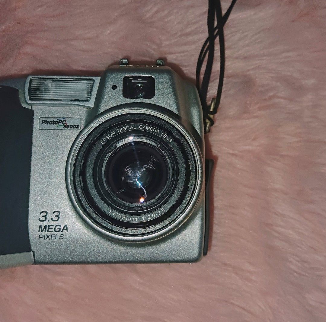EPSON PhotoPC 3000z (Category: Cameras) located in Caloocan City. Submitted by maesmaes (Listing ID 1435007029, Image 2). Description: epson photopc 3000z [rare] price is negotiable raw shots provided » 3.3 megapixels » fully functional » max res. 2048 x 1536 » cosmetics - 9/10 » uses 4 AA batteries » comes with og pouch, strap, CF card.