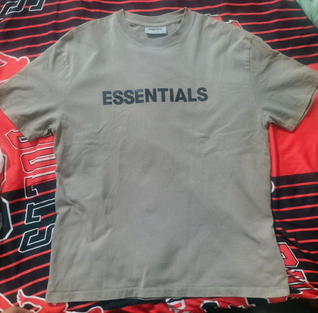 Essentials Fear of God T-shirt - Olive Green (Category: Tshirts & Polo Shirts ) located in Las Pinas. Submitted by live_marticko (Listing ID 1434935624, Image 1). Description: Essentials Fear of God T-shirt - Olive Green Shirt ✅Size: S on tag (Best fit M to L) ✅Color: Olive Green ✅Dimension: Width: 22.5" Length: 28 ✅Colorate: 9.5/10 - Olive green Essentials Fear of God T-shirt - Size: S - Material: 100% Cotton - Features "ESSENTIALS" print on the
