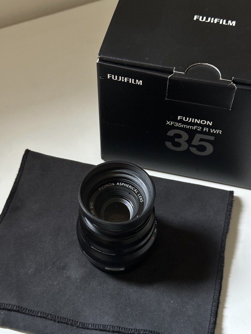 Fujinon XF35mmF2 R WR (Category: Lens & Kits) located in Manila. Submitted by r.ivrsn (Listing ID 1435029931, Image 2). Description: Fujifilm Fujinon XF35mmF2 R WR Package contents: •Interchangeable lens XF35mmF2 R WR •Lens wrapping cloth •Lens hood not included: •Lens cap other inclusions: •Kenko lens protector Rfs: •barely used. Condition: •Used - minimal scratches.