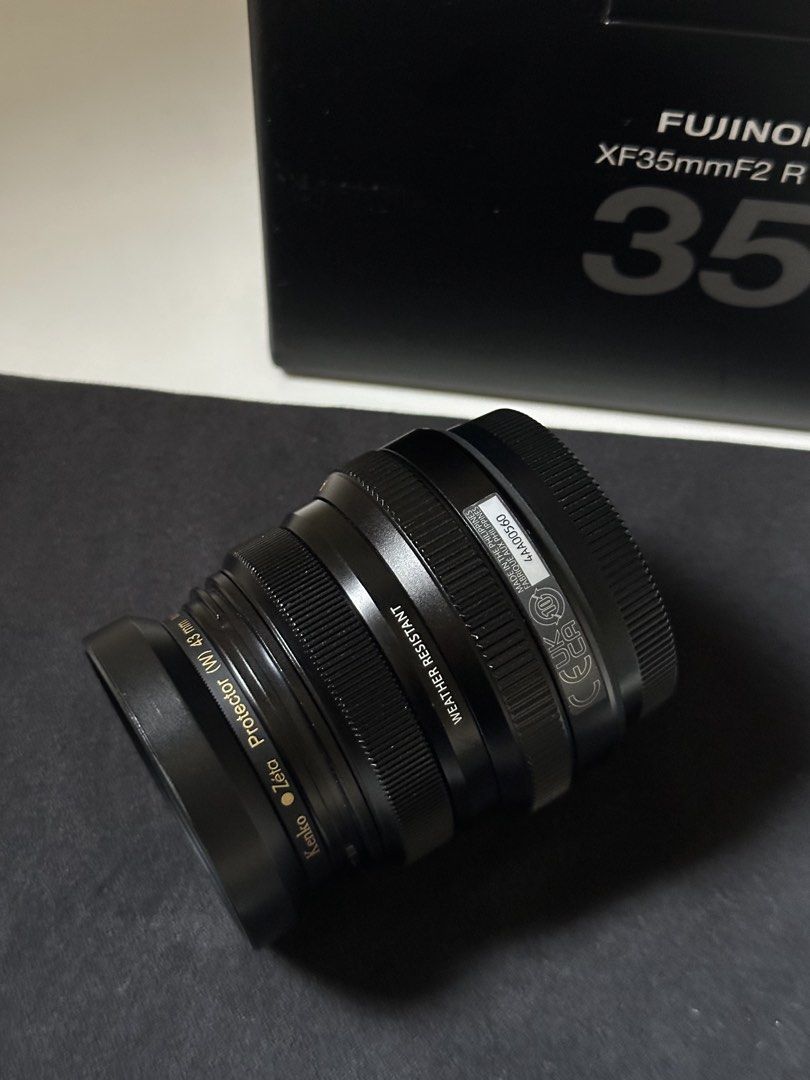 Fujinon XF35mmF2 R WR (Category: Lens & Kits) located in Manila. Submitted by r.ivrsn (Listing ID 1435029931, Image 3). Description: Fujifilm Fujinon XF35mmF2 R WR Package contents: •Interchangeable lens XF35mmF2 R WR •Lens wrapping cloth •Lens hood not included: •Lens cap other inclusions: •Kenko lens protector Rfs: •barely used. Condition: •Used - minimal scratches.