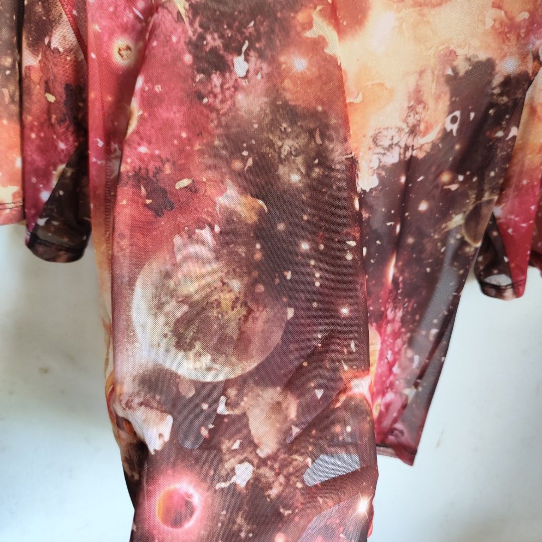 Galaxy Print Mesh T-shirt (Category: Shirts) located in Tacloban City. Submitted by sopic (Listing ID 1435068594, Image 3). Description: - Galaxy print mesh t-shirt - Short sleeves - Black crew neck - Lightweight, semi-sheer fabric - W: 16in, L: 17in.
