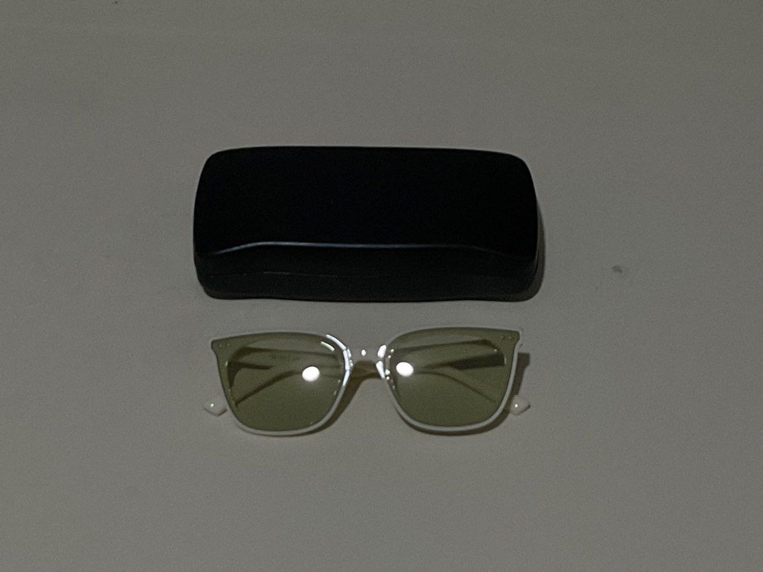 [NEW] Gentle Monster Sunglasses (Category: Sunglasses & Eyewear) located in Quezon City. Submitted by _aceys (Listing ID 1435140504, Image 1). Description: - Gentle Monster sunglasses - White frame, green-tinted lenses - Includes black case - Includes microfiber pouch - Includes card - Modern and fashionable design - Ideal for everyday use - Provides protection when not in use.