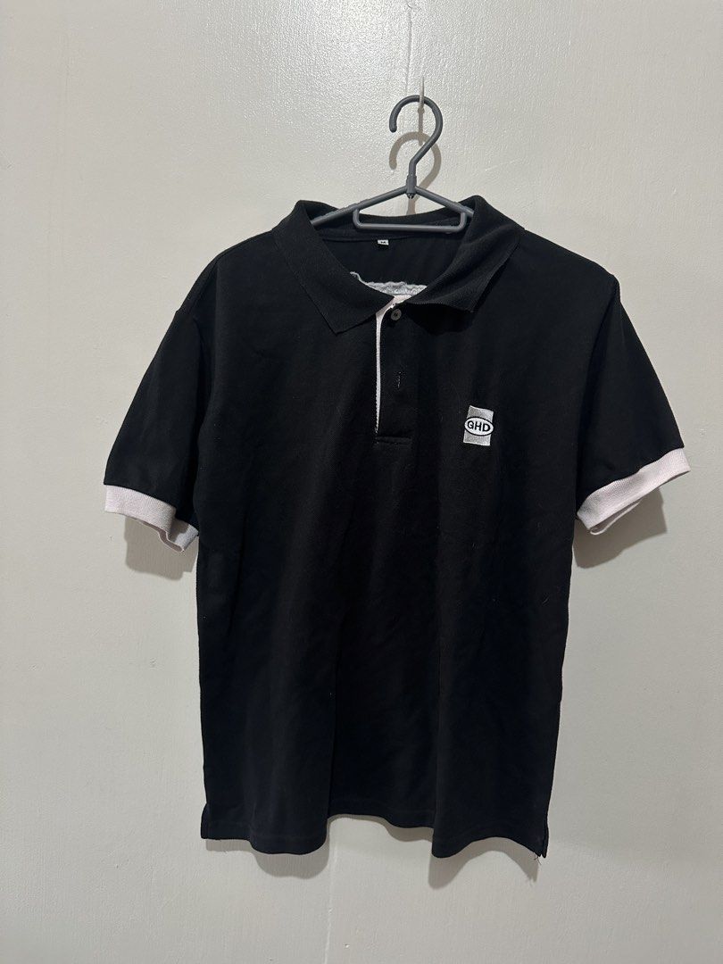 GHD Black Polo Shirt (Category: Tshirts & Polo Shirts ) located in Caloocan City. Submitted by _chinkypotato16 (Listing ID 1435026777, Image 1). Description: Brand: N/A - Black polo shirt, size M - White accents on sleeves - GHD logo on front - "The Power of Commitment" printed on back - Classic polo collar - Buttoned placket 💳 Mode of Payment: 💙 Gcash 🛵 Mode of Delivery: Same Day - Grab Express/ Lalamove .