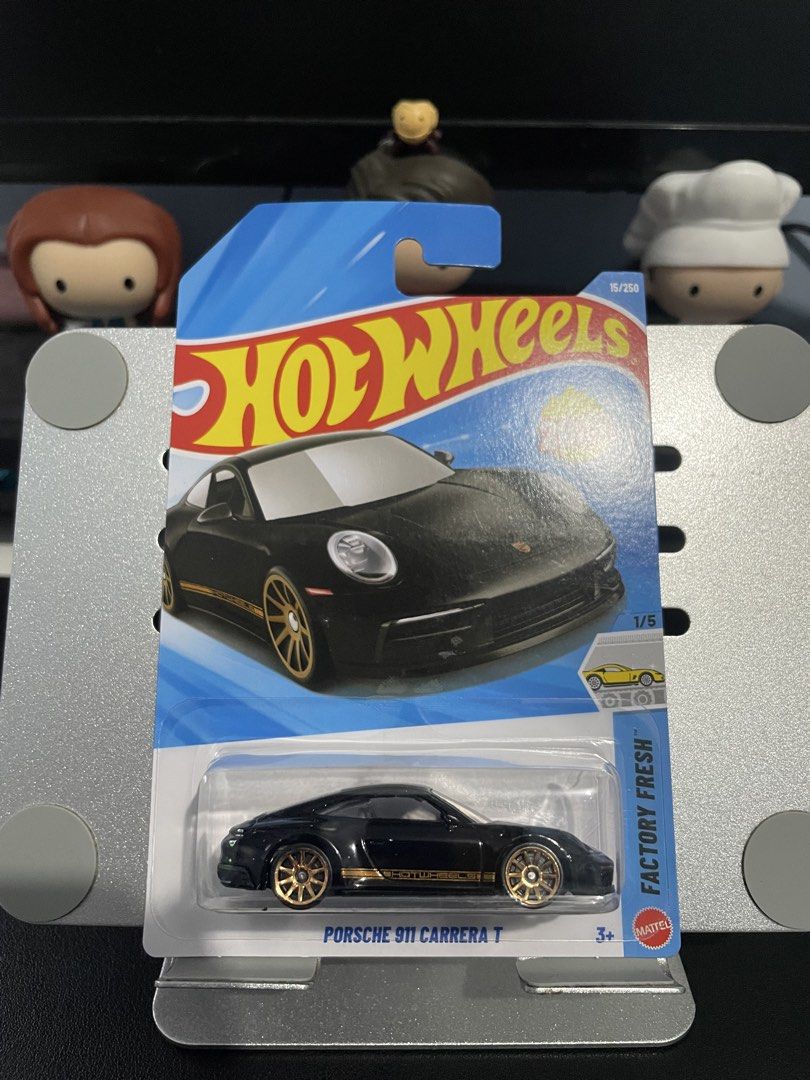 Hot Wheels Porsche 911 Carrera T (Category: Vehicle & Diecast Models) located in Quezon City. Submitted by glenkun (Listing ID 1435002955, Image 1). Description: - Hot Wheels Porsche 911 Carrera T diecast car - Black with gold accents and gold wheels Located at Sampaloc Manila near NU. Can do meetup at Gateway cubao or Shaw mrt, makati by schedule. Thanks admin.