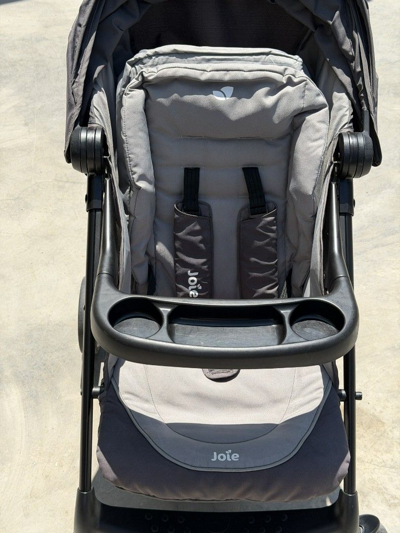 Joie x muse Stroller (Category: Strollers) located in Manila. Submitted by bentanimike (Listing ID 1435102639, Image 3). Description: - Joie Pact Lite stroller - Dark grey color - Compact and lightweight design - Features a sun canopy - Includes a tray for drinks and snacks - Has a storage basket - Folds easily for storage and transport - Suitable for babies and toddlers.