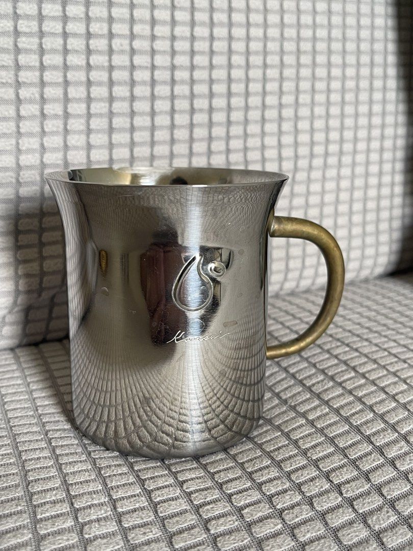 Kansai Stainless Steel Mug (Category: Coffee & Tea Tableware) located in Manila. Submitted by dstrangerthings (Listing ID 1435050692, Image 1). Description: - Vintage stainless steel mug - Features a brass handle .