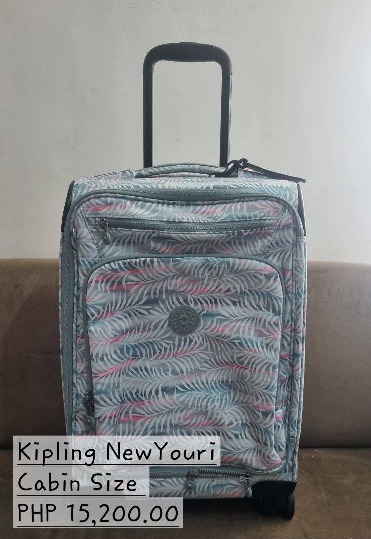 Kipling New Youri Cabin Size Luggage (Category: Luggage) located in Lipa City. Submitted by naomirobles (Listing ID 1435124889, Image 1). Description: Kipling New Youri cabin size luggage. Features a unique leaf pattern. Includes a retractable handle and wheels for easy transport. Perfect for carry-on luggage. Original price is PHP 15,200.00..