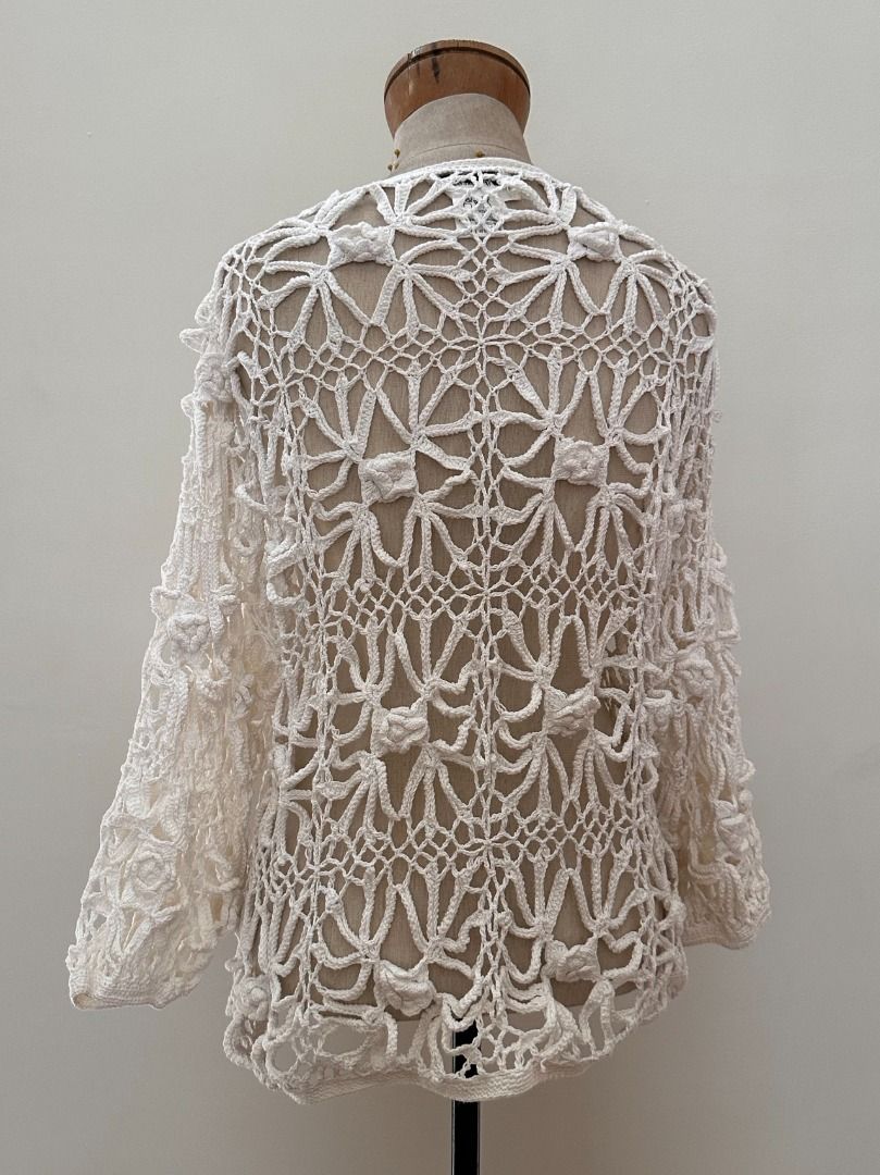 VINTAGE Kroshetta Crochet Top (Category: Blouses) located in Botolan. Submitted by kstyled (Listing ID 1435075407, Image 3). Description: Vintage Kroshetta Hand-Crocheted Crocheted Floral Statement Blouse Brand: Kroshetta (Specially Made) Size: Large (L) Color: Classic Cream / Off-White Fabric: 100% Cotton Style: An exquisite, open-knit crochet blouse featuring oversized floral starburst motifs and 3D textured "popcorn" accents for added dimensio