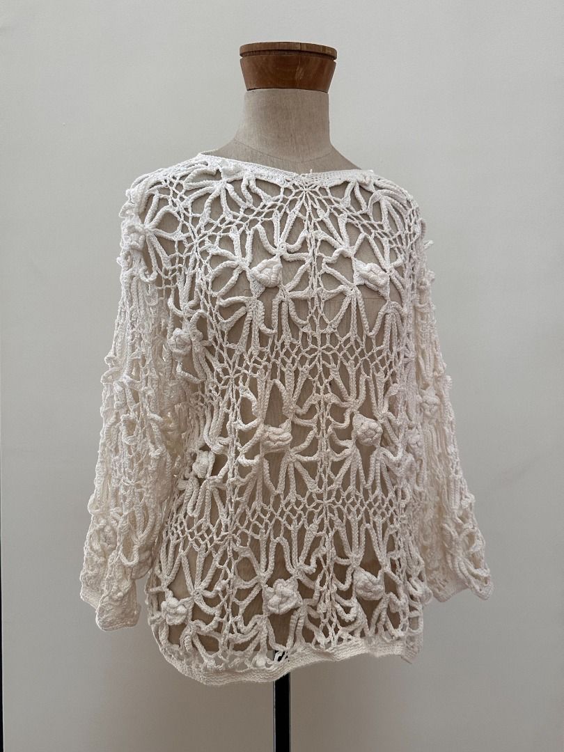 VINTAGE Kroshetta Crochet Top (Category: Blouses) located in Botolan. Submitted by kstyled (Listing ID 1435075407, Image 2). Description: Vintage Kroshetta Hand-Crocheted Crocheted Floral Statement Blouse Brand: Kroshetta (Specially Made) Size: Large (L) Color: Classic Cream / Off-White Fabric: 100% Cotton Style: An exquisite, open-knit crochet blouse featuring oversized floral starburst motifs and 3D textured "popcorn" accents for added dimensio