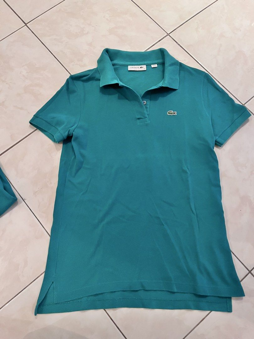 Lacoste Classic Fit Polo Shirt (Category: Shirts) located in Quezon City. Submitted by markupapparel (Listing ID 1435009910, Image 2). Description: - Authentic Lacoste polo shirt - Teal green color - Classic fit - Size 38 - Button-down collar - Made in Peru - Comfortable for everyday wear.