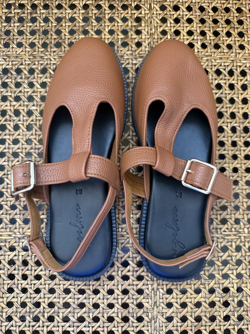 Local Brand Mules in Tan leather (Category: Flats & Sandals) located in Binan City. Submitted by toppicks715 (Listing ID 1435049676, Image 1). Description: -Bnew Angelina Footwear (local IG brand) Camellia Mules -size 25cm -color Tan -super comfy to wear!!!.