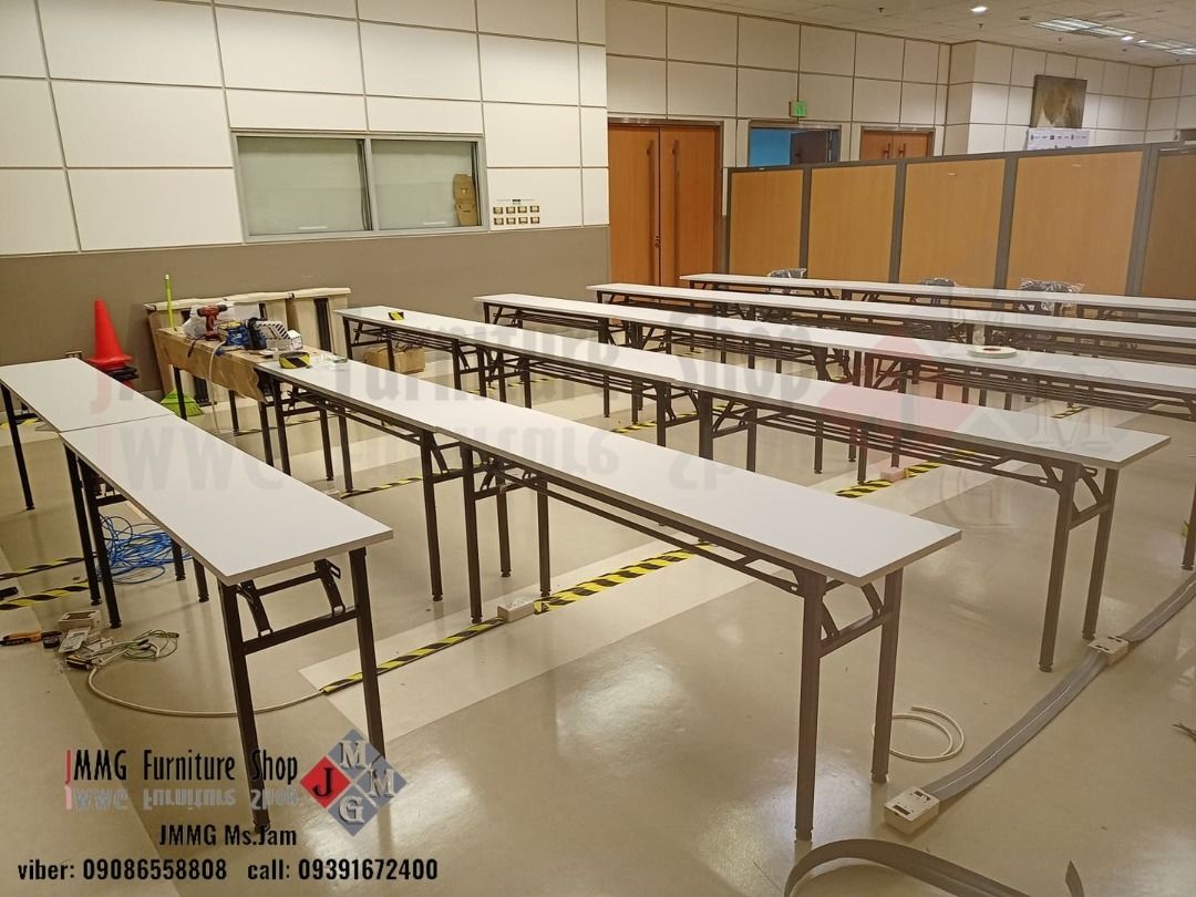 Long Folding Tables (Category: Tables & Sets) located in Caloocan City. Submitted by brightgem-d4ebba (Listing ID 1435010581, Image 2). Description: Durable long folding tables with white tabletops and black metal frames. Suitable for various events and gatherings. The tables are designed for easy setup and storage. Contact the seller for inquiries..