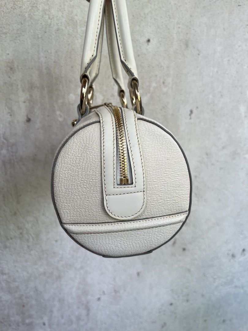 louis quatorze barrel bag (Category: Shoulder Bags) located in Panglao. Submitted by ag.prelovedbags (Listing ID 1435113573, Image 3). Description: off white/cream color • ykk zipper • 11 x 5.5 size.