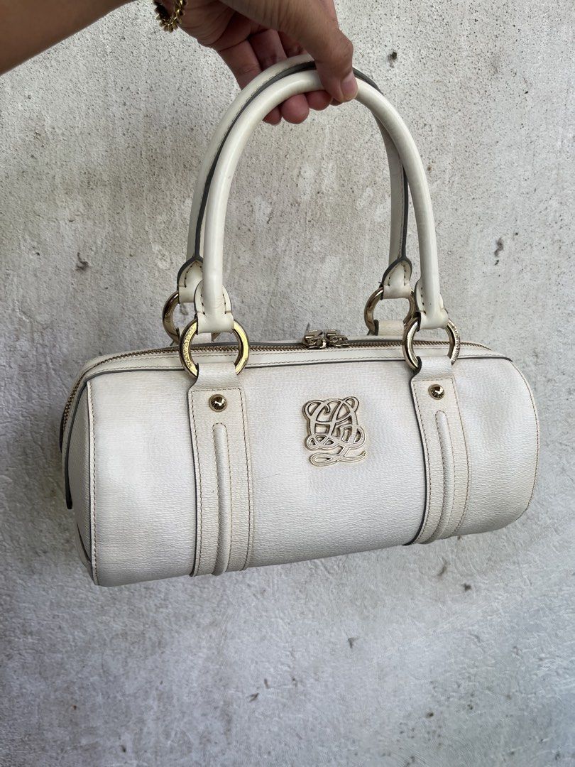 louis quatorze barrel bag (Category: Shoulder Bags) located in Panglao. Submitted by ag.prelovedbags (Listing ID 1435113573, Image 1). Description: off white/cream color • ykk zipper • 11 x 5.5 size.