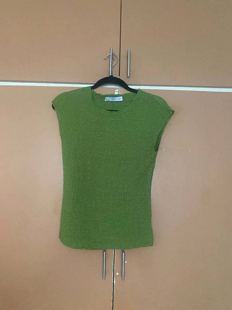 Mango Green Textured Top (Category: Blouses) located in Mandaluyong City. Submitted by ja.declutters (Listing ID 1435077345, Image 1). Description: - Mango green textured top - Round neckline - Unique crinkled texture - Dress up or down.