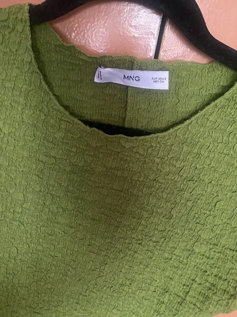 Mango Green Textured Top (Category: Blouses) located in Mandaluyong City. Submitted by ja.declutters (Listing ID 1435077345, Image 3). Description: - Mango green textured top - Round neckline - Unique crinkled texture - Dress up or down.