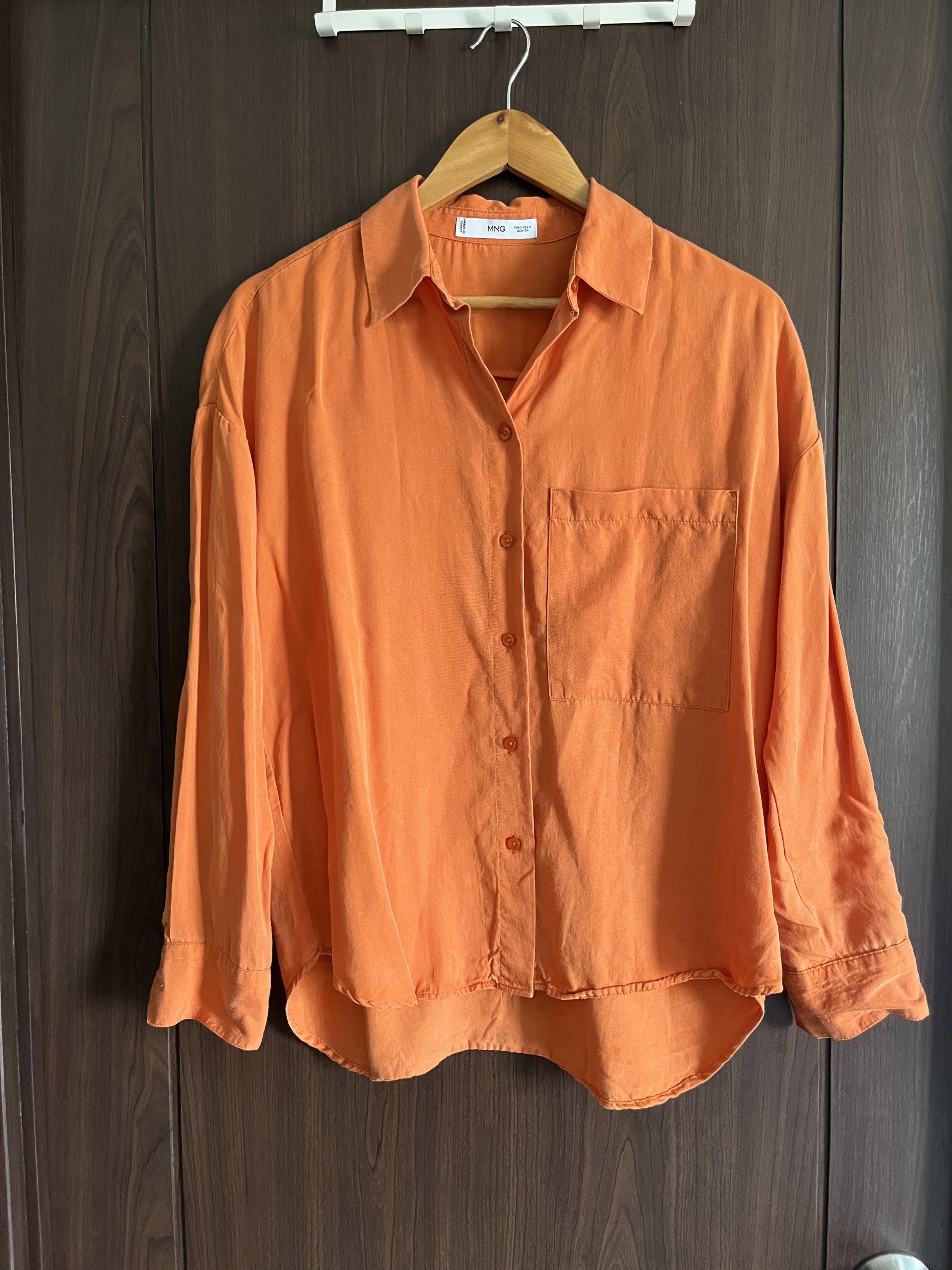 Mango Orange oversized Top (Category: Longsleeves) located in Manila. Submitted by mentone (Listing ID 1435080774, Image 2). Description: US 4 Chest 22” | Length 24/26”.