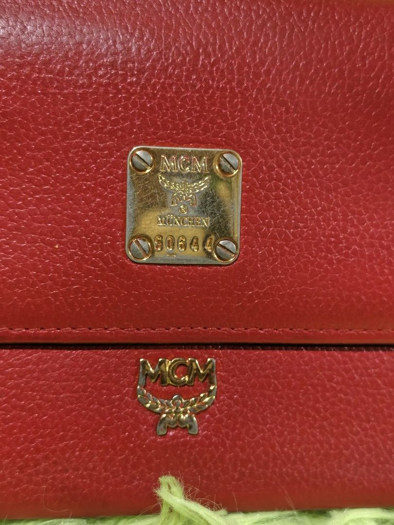 Mcm long wallet (Category: Luxury Bags & Wallets) located in Davao. Submitted by ukaystuff07 (Listing ID 1435165431, Image 2). Description: preloved from Korean box >leather >naiikot turnilyo >side by side pocket >excellent condition > hardware are 75% gold pa.