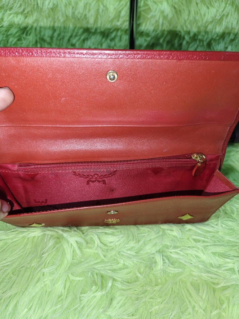 Mcm long wallet (Category: Luxury Bags & Wallets) located in Davao. Submitted by ukaystuff07 (Listing ID 1435165431, Image 3). Description: preloved from Korean box >leather >naiikot turnilyo >side by side pocket >excellent condition > hardware are 75% gold pa.
