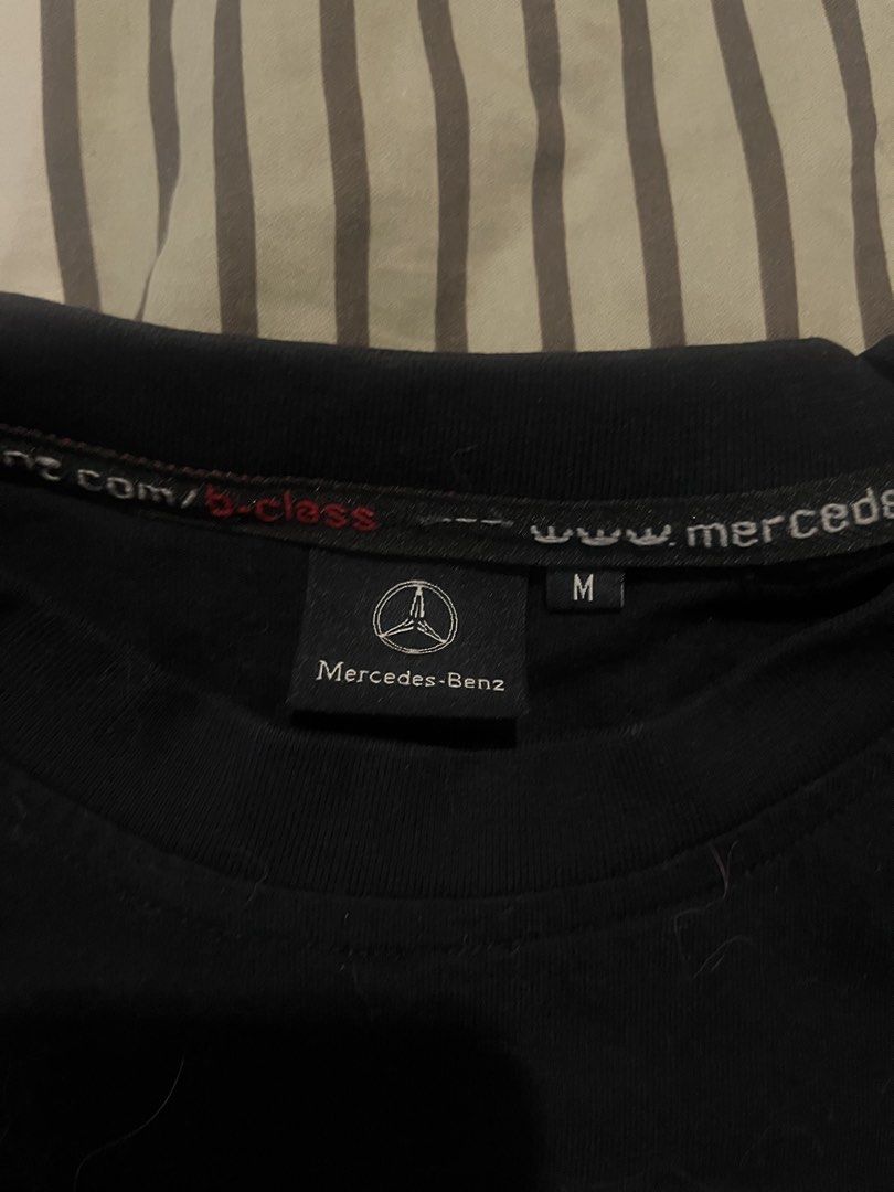 Mercedes-Benz B-Class T-Shirt (Category: Tshirts & Polo Shirts ) located in Manila. Submitted by domsyy (Listing ID 1435155994, Image 2). Description: - Black Mercedes-Benz B-Class T-shirt - Size: M - 27x18 - Features a large 'B' design on the front - Crew neck and short sleeves - Includes Mercedes-Benz logo on neck tag.