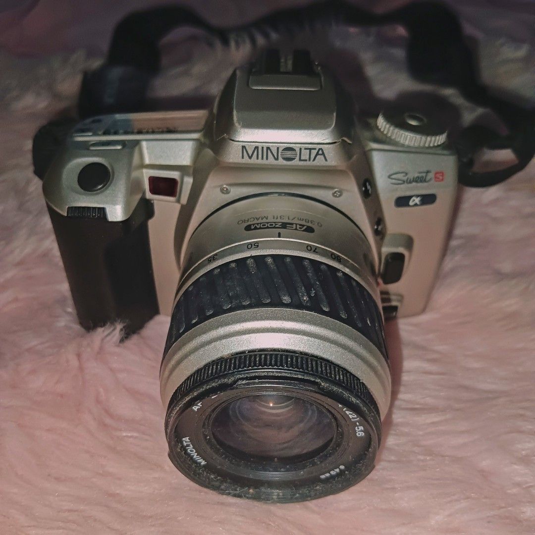 Minolta Alpha Sweet (Category: Cameras) located in Caloocan City. Submitted by maesmaes (Listing ID 1435007743, Image 2). Description: minolta alpha sweet s P2000, negotiable » 35mm SLR film camera » checked for CLA, functional but unused » flash and camera modes are all working fine » viewfinder's a bit pinkish, doesn't affect output » cosmetics - 8/10 » powered by 2 CR2 batteries.