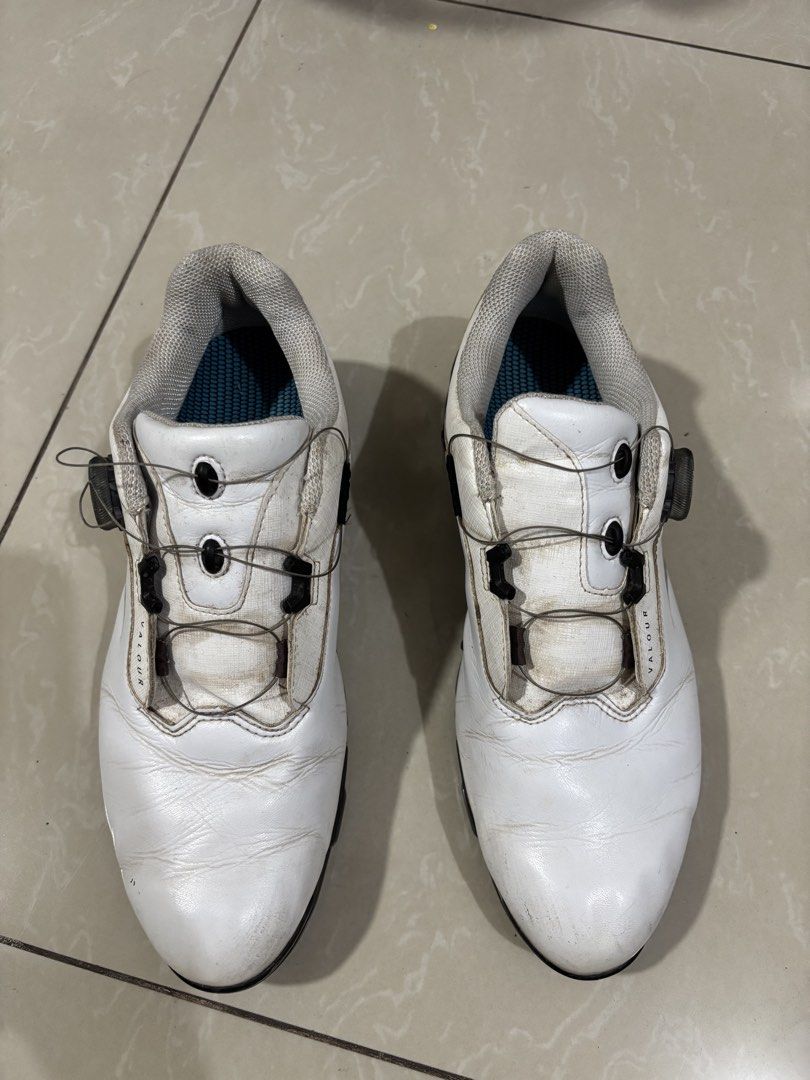 Mizuno Valour Genem Golf Shoes (Category: Golf) located in Manila. Submitted by antonatien65243 (Listing ID 1435116452, Image 2). Description: - Mizuno Valour golf shoes - Color: White with black accents - Size: US 9.5, EUR 42.5 - Closure: BOA system - Made in Vietnam - Condition: Signs of wear on soles and upper.