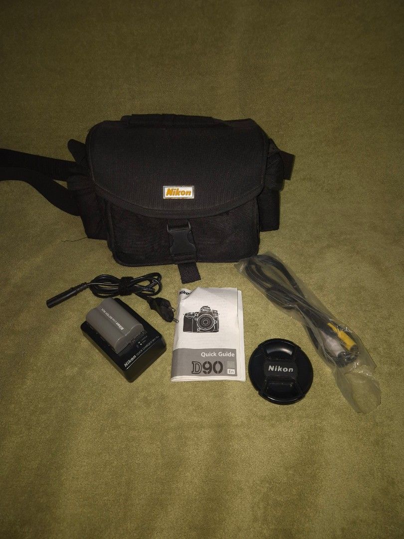 Nikon D90 (Category: Cameras) located in Manila. Submitted by gcvv_ (Listing ID 1435118919, Image 1). Description: Price is negotiable for SURE BUYER. All accesories are included, used for school events only. Issue: - Cap/lid for connectors loss.