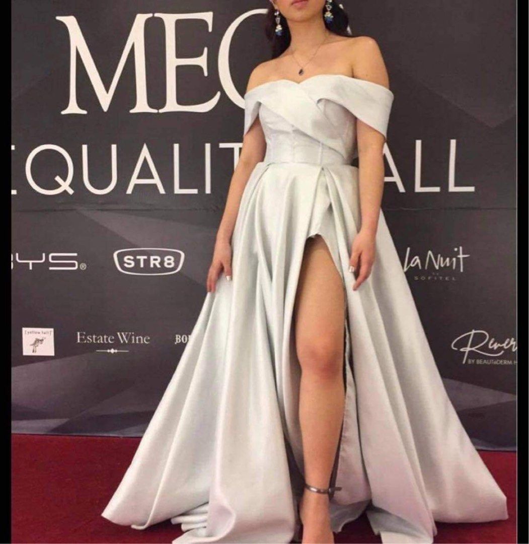 Ball Gown for sale (Category: Evening dresses & gowns) located in Taguig. Submitted by col12345 (Listing ID 1435122507, Image 1). Description: - Off-shoulder evening gown - Luxurious satin fabric - Flattering fitted bodice - Flowing skirt with a high slit - Floor-length design - Classic and elegant style - Ideal for formal events - Light, neutral color May minimal flaw unnoticeable scratches but nilagyan ng beads para magkadesign not halata (see 