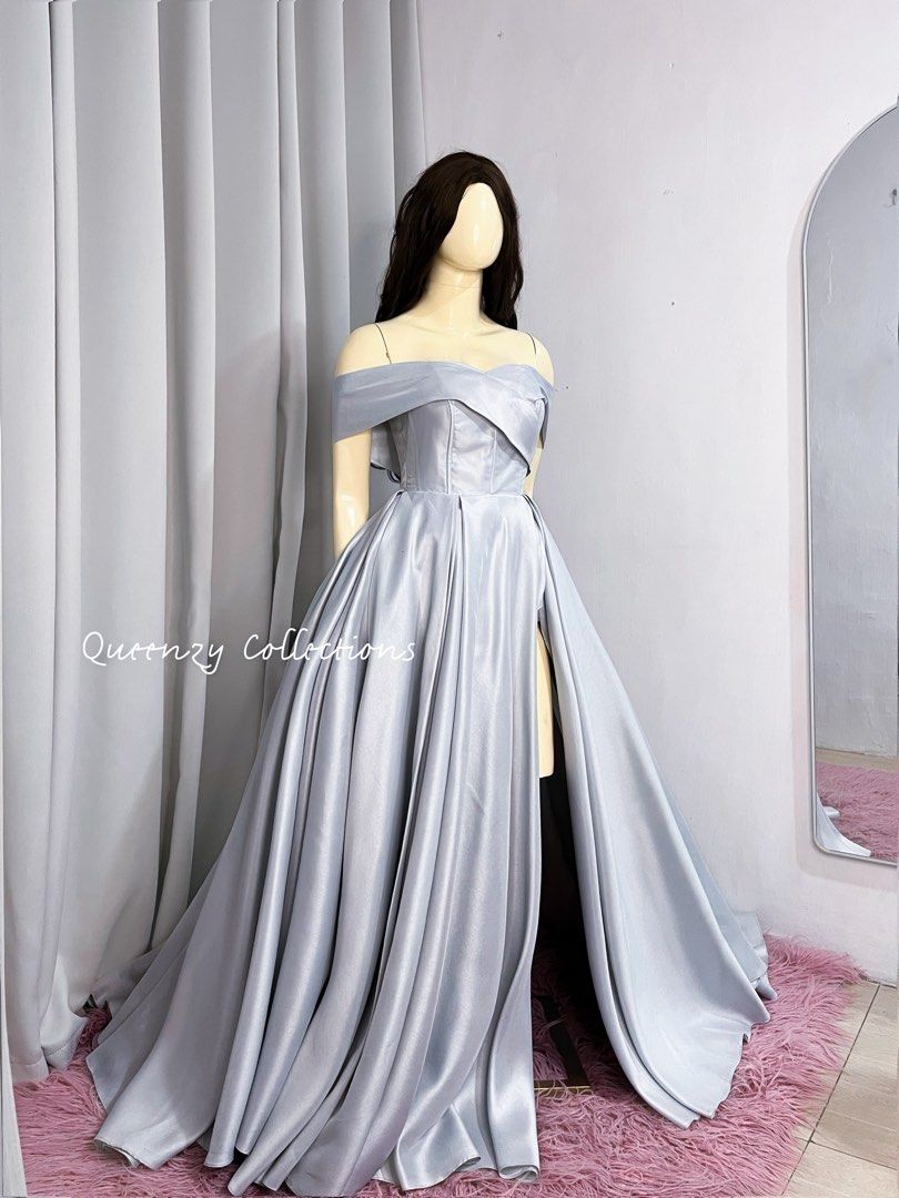 Ball Gown for sale (Category: Evening dresses & gowns) located in Taguig. Submitted by col12345 (Listing ID 1435122507, Image 3). Description: - Off-shoulder evening gown - Luxurious satin fabric - Flattering fitted bodice - Flowing skirt with a high slit - Floor-length design - Classic and elegant style - Ideal for formal events - Light, neutral color May minimal flaw unnoticeable scratches but nilagyan ng beads para magkadesign not halata (see 