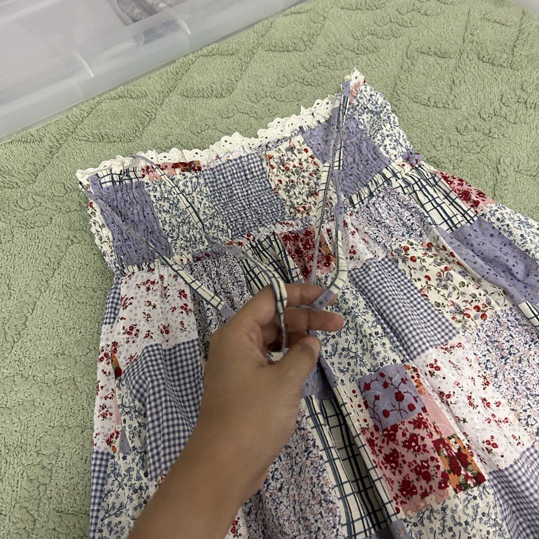 Patchwork Skirt (Category: Skirts) located in Rawang. Submitted by baddies_ (Listing ID 1435091749, Image 2). Description: - Waist from 26 can stretch till 34 (Ukur lilit) - Length 34 inch - Floral and checkered patterns - Colors: Purple, white, red - Elasticated waistband with drawstring - White lining - Comfortable and stylish.