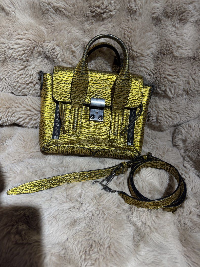 Philipe lim (Category: Luxury Bags & Wallets) located in Quezon City. Submitted by mathezedc (Listing ID 1435073519, Image 1). Description: Philipp lim preloved Good condition well used With strap only .