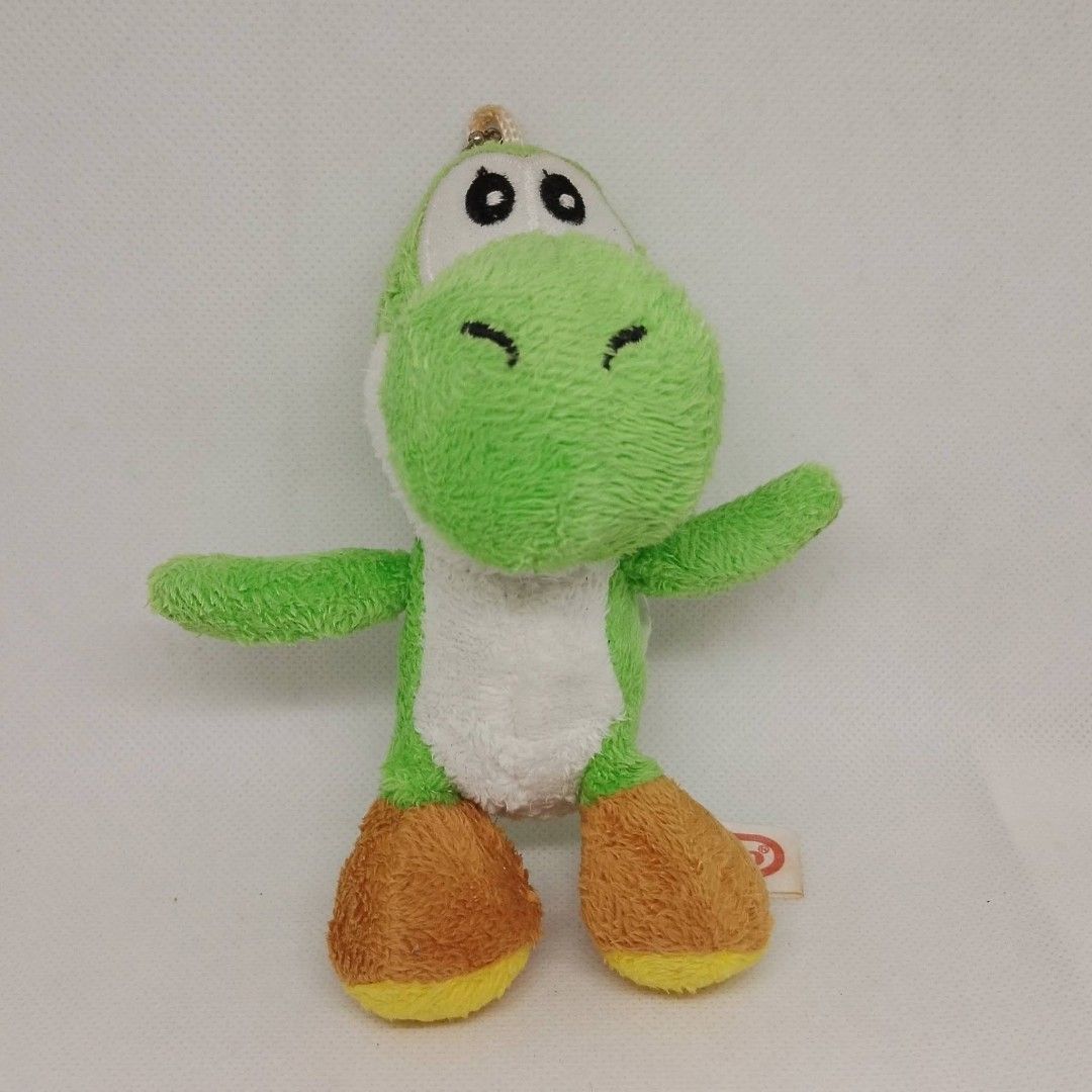 PLUSH CHARM Yoshi Super Mario Brothers (Category: Plushies & Soft Toys) located in Baguio. Submitted by boxmania (Listing ID 1435016695, Image 1). Description: From HK/UK/Dubai/Canada or Japan Surplus Box What you see is what you get No return, no exchange (random item po nakukuha ng seller sa box).