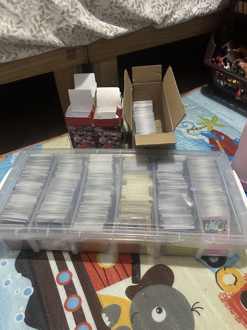 Pokemon Bulks 5000+ pcs (Category: Raw Singles) located in Quezon City. Submitted by renadetorres (Listing ID 1435169119, Image 2). Description: Mixed language & color borders Ung nasa lagayan po, lahat English & Japanese, yung nsa likuran ung mga boxes mix chinese and korean po w/ yellow borders included From sword and shield era to modern Estimated 5000+ pcs P5,500 kasama na po ung lalagyan nasa 700 din bili namen P5,000 if di po ksma ung lagay