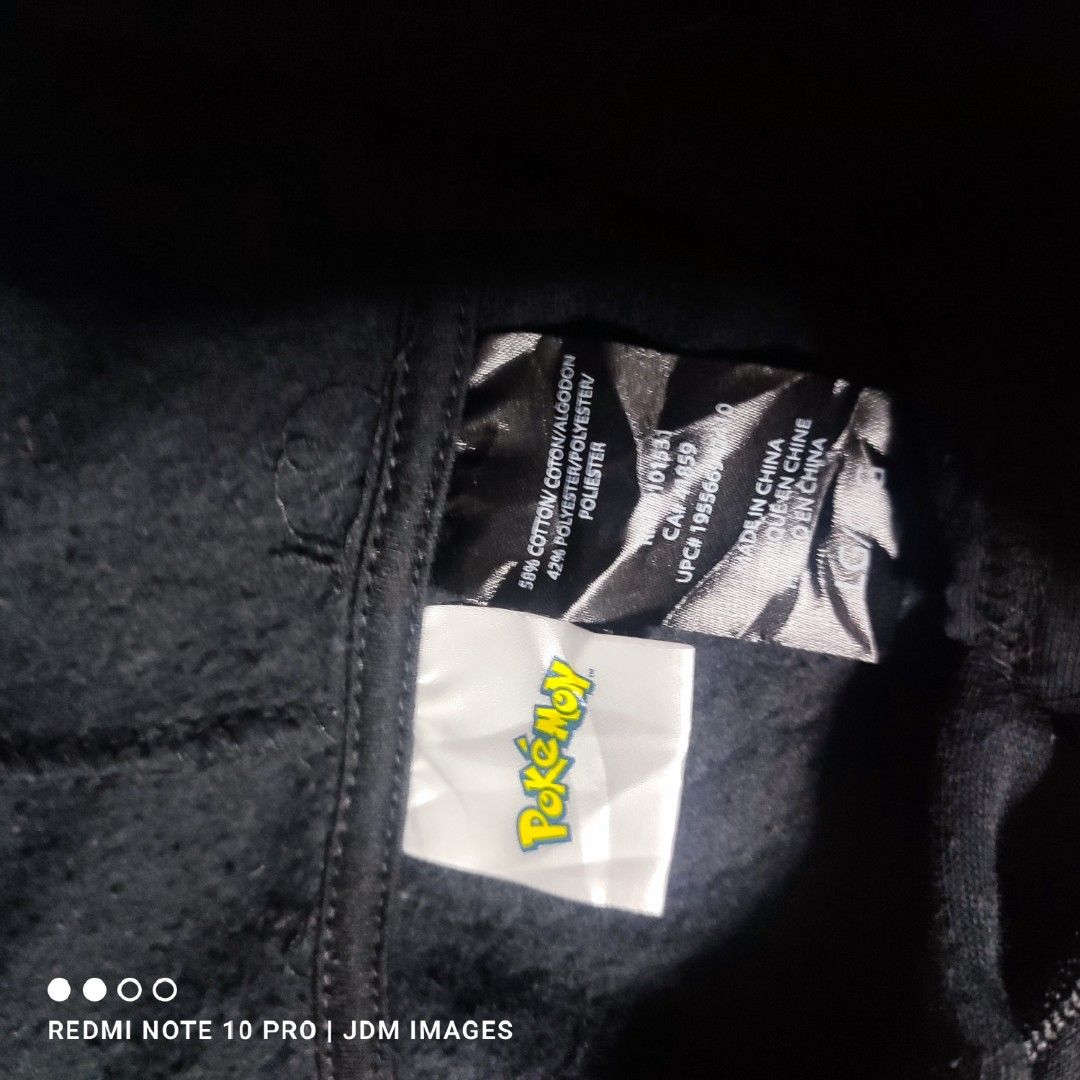 Pokemon Pikachu Hoodie (Category: Hoodies) located in Antipolo. Submitted by klashnikov (Listing ID 1435007875, Image 3). Description: Paubos sale!!! - Black Pikachu hoodie - Features "Pika Pika Pika!" design - Official Pokemon licensed product - Made with cotton and polyester blend -Dimes: width 22", length 27" - Includes hood and front pocket In excellent condition Like new Honest issue: used Price 200phpna lang Pwede videocall for legitimacy P
