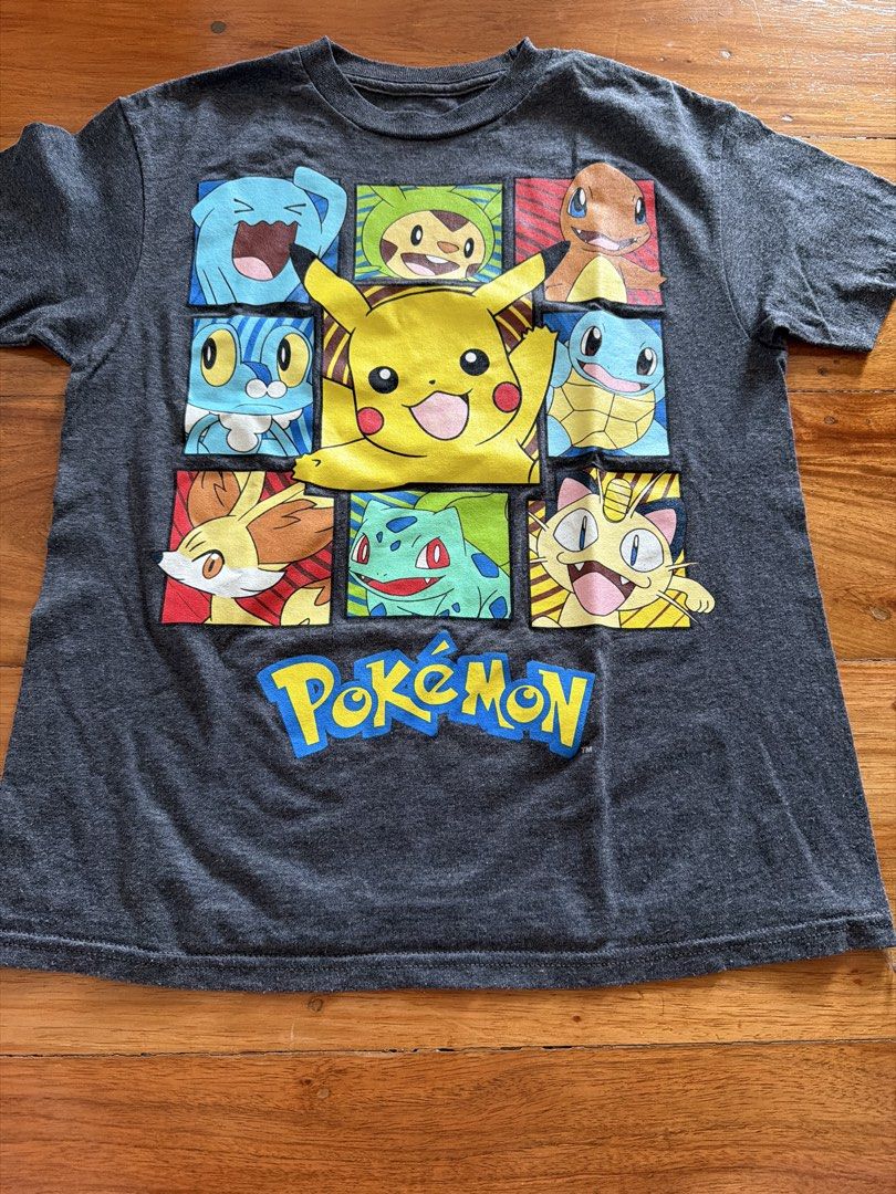 Pokemon T-shirt XS (Category: Babies & Kids Fashion) located in Las Pinas. Submitted by oliveguns (Listing ID 1435072196, Image 1). Description: - Pokemon T-shirt - Size: XS fits 6-8yo - Width: 15 inches - Color: Dark Gray.