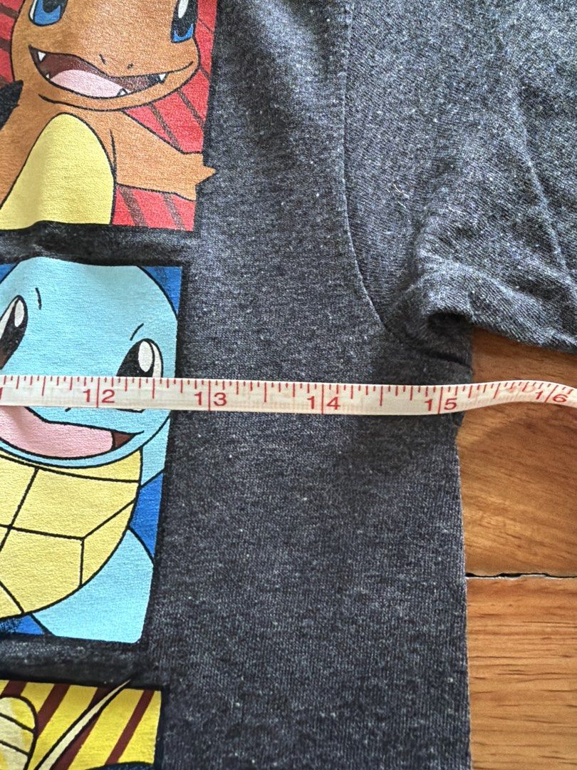 Pokemon T-shirt XS (Category: Babies & Kids Fashion) located in Las Pinas. Submitted by oliveguns (Listing ID 1435072196, Image 3). Description: - Pokemon T-shirt - Size: XS fits 6-8yo - Width: 15 inches - Color: Dark Gray.