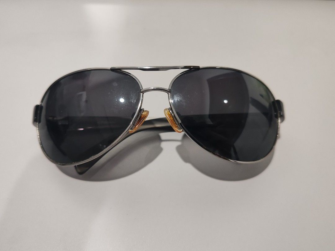 Polaroid Sunglasses with Case unisex (Category: Announcements) located in Pasig City. Submitted by geraldnee28280 (Listing ID 1435083980, Image 3). Description: - Silver frame aviator sunglasses - Dark lenses - Black arms - not sure if this is the originap box, Includes black storage box with red interior.