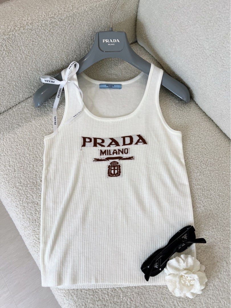 ⚜️Prada knit top (Category: Luxury Apparel) located in Makati City. Submitted by 90sangel (Listing ID 1435158608, Image 1). Description: •Item: Prada knitwear top •Size: S-L frame •Condition: As New!.